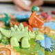 2 viename konstruktoriaus rinkinys Dinozaurai Stalo žaidimas + 46 dalių kauliukai WOOPIE