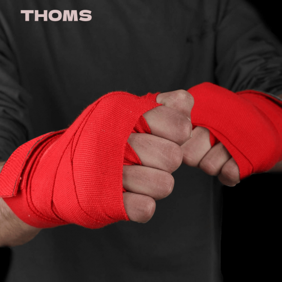 Bokso tvarstis THOMS Real Red 5cm x 4,5m iš 100% medvilnės Bokso tvarstis THOMS Real Red 5cm x 4,5m iš 100% medvilnės