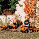 Oranžinis traktorius su priekaba + priedai nuo 1 metų FALK Kubota